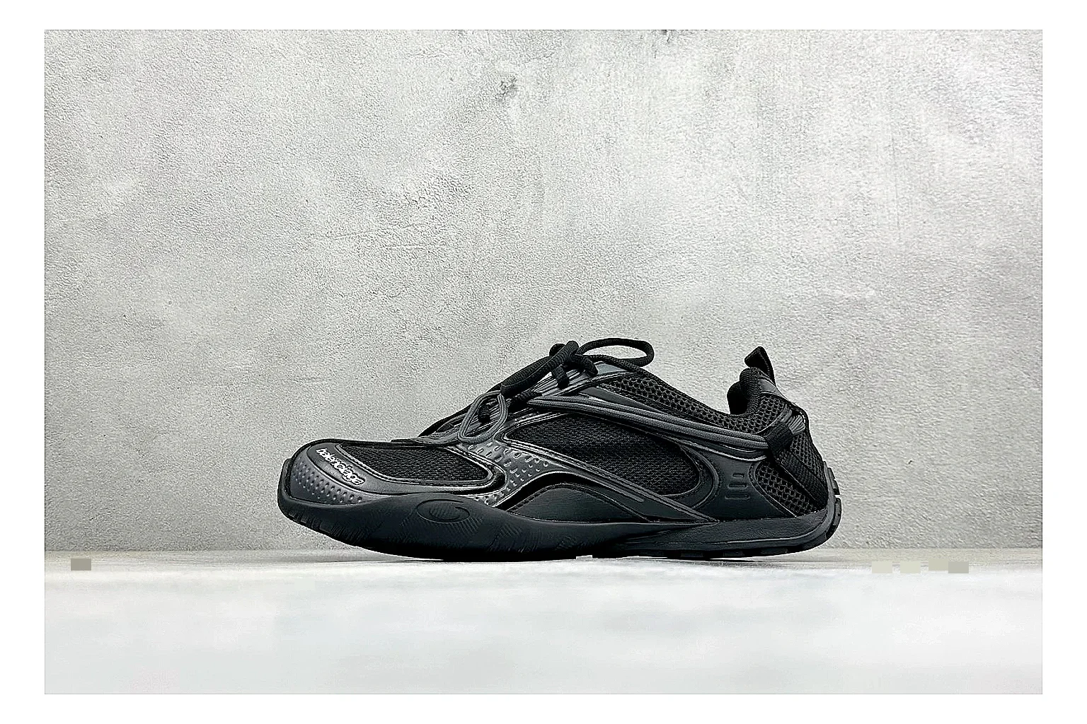 Balenciaga Track Black Low-Top budget find photo showing black layered technical upper, complex paneling, chunky runner sole, and tactical low-top shape