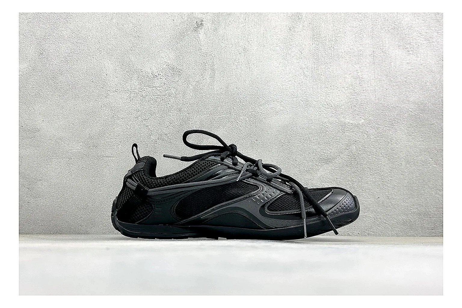 Balenciaga Track Black Low-Top budget find photo showing black layered technical upper, complex paneling, chunky runner sole, and tactical low-top shape thumbnail 2