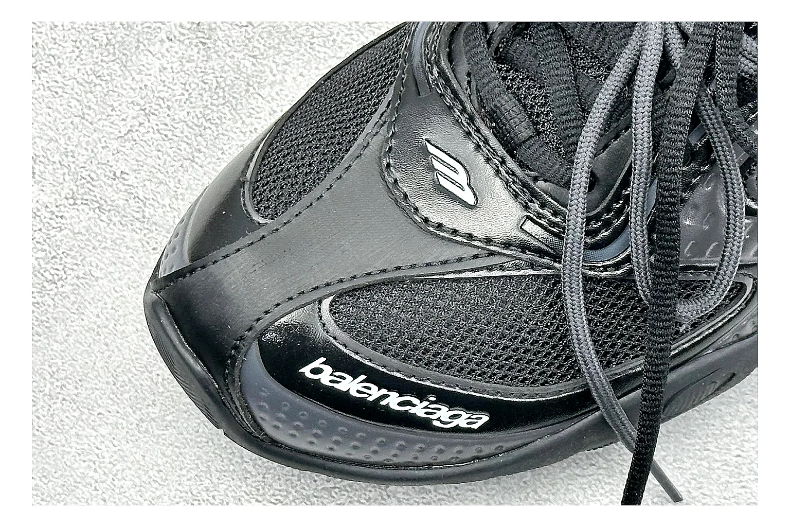 Balenciaga Track Black Low-Top budget find photo showing black layered technical upper, complex paneling, chunky runner sole, and tactical low-top shape thumbnail 6