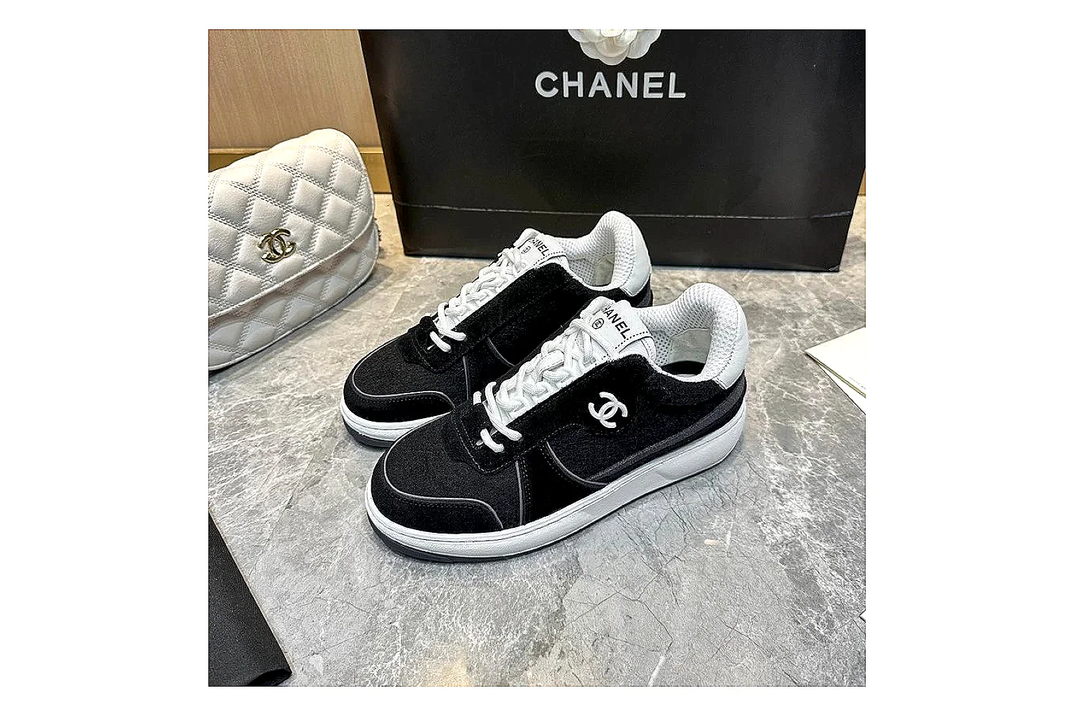 Kako Find List budget photos for Chanel Black Runner Sneaker thumbnail 2