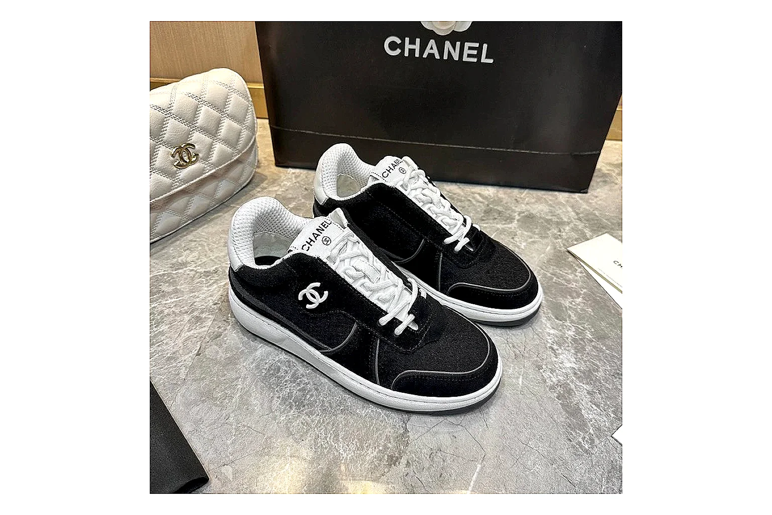 Kako Find List budget photos for Chanel Black Runner Sneaker thumbnail 3