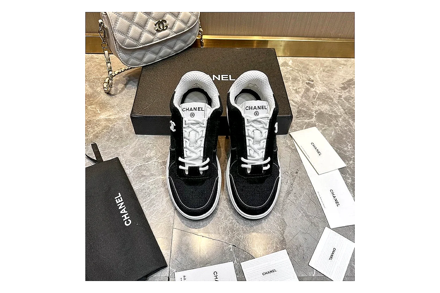 Kako Find List budget photos for Chanel Black Runner Sneaker thumbnail 6