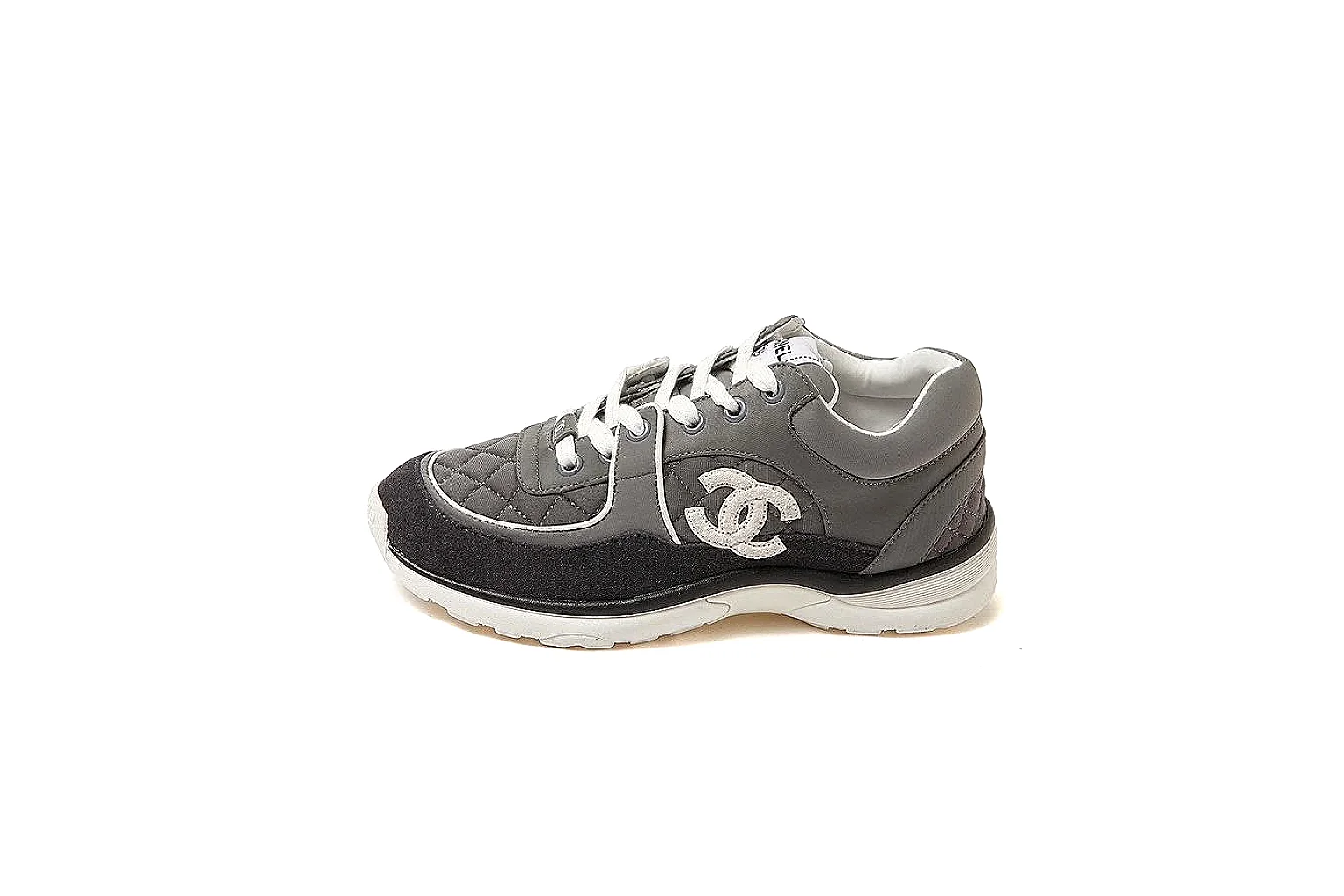 Kako Find List budget photos for Chanel Black Runner Sneaker