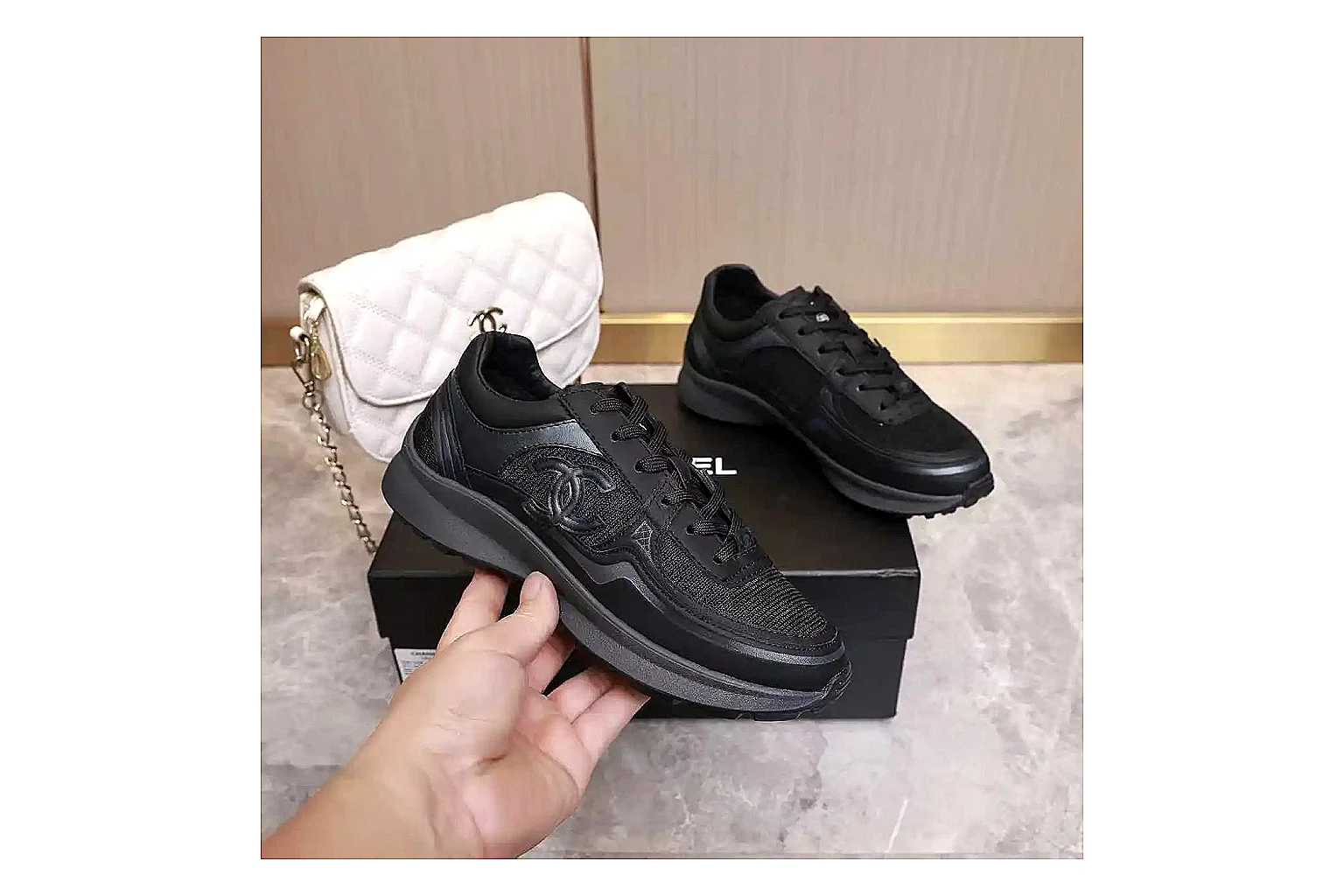Kako Find List budget photos for Chanel Black Runner Sneaker thumbnail 4