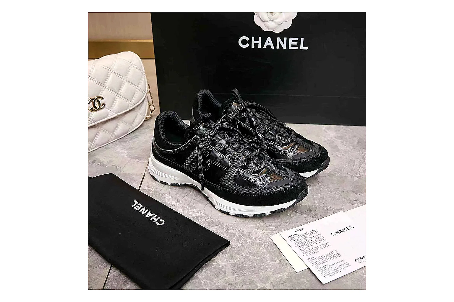 Kako Find List budget photos for Chanel Black Runner Sneaker thumbnail 2