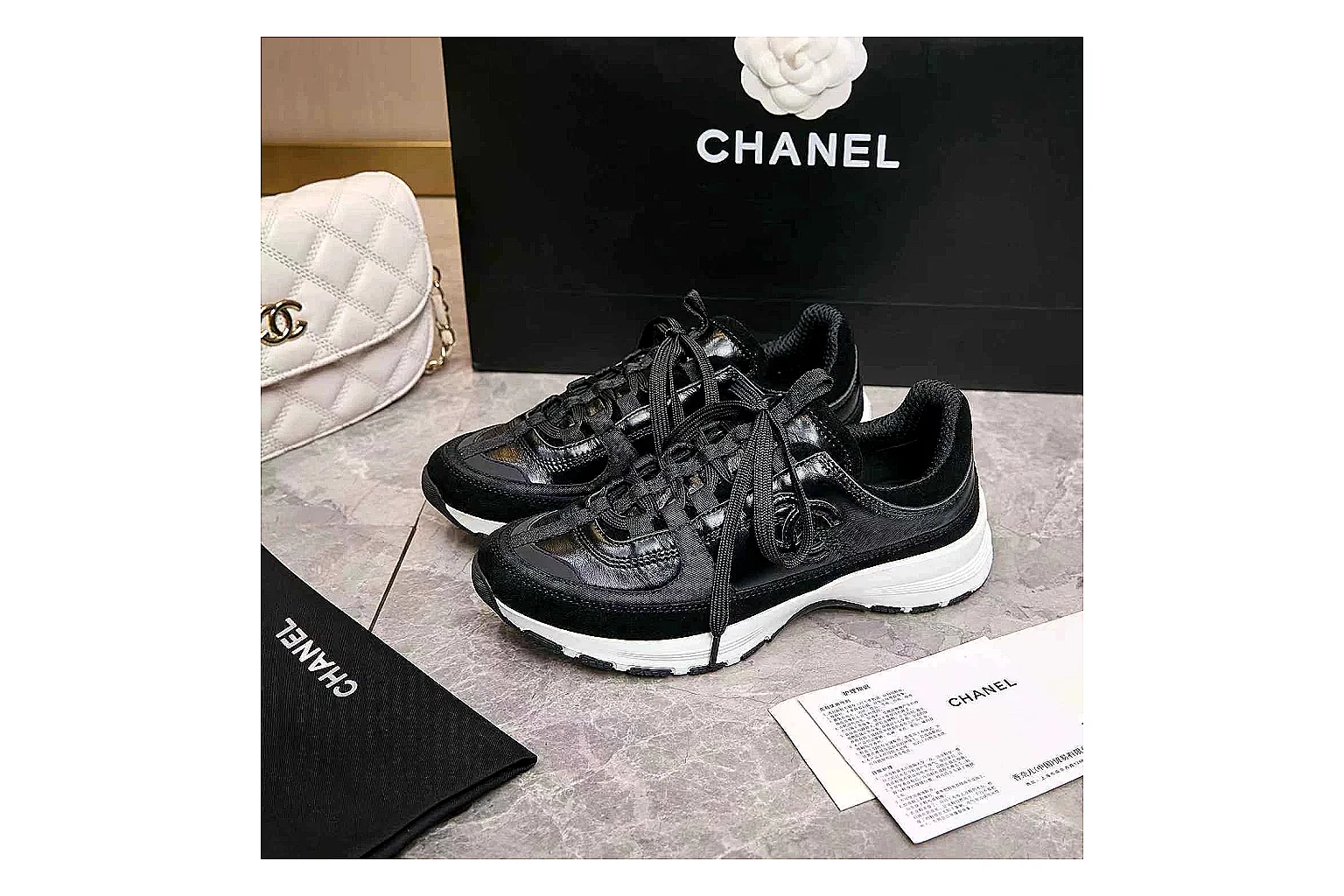 Kako Find List budget photos for Chanel Black Runner Sneaker thumbnail 3