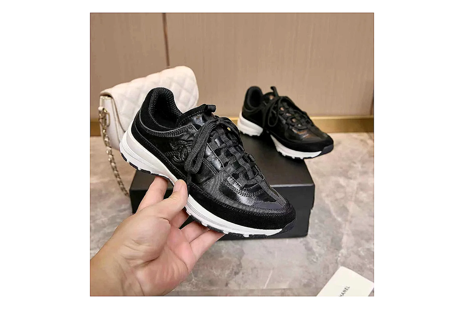 Kako Find List budget photos for Chanel Black Runner Sneaker thumbnail 4