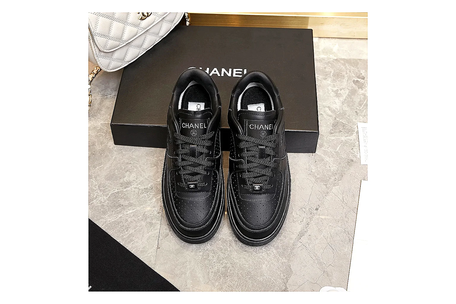 Kako Find List budget photos for Chanel Black Runner Sneaker thumbnail 6