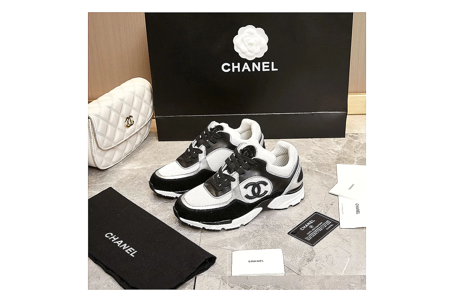 Kako Find List budget photos for Chanel Black White Runner Sneaker thumbnail 3
