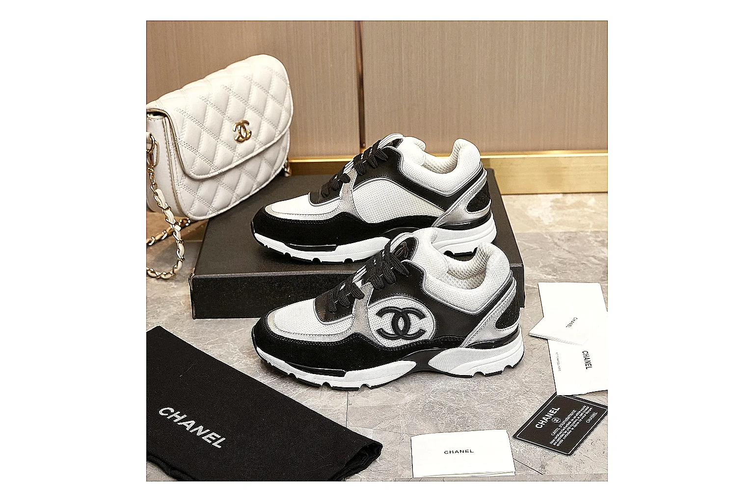 Kako Find List budget photos for Chanel Black White Runner Sneaker thumbnail 4