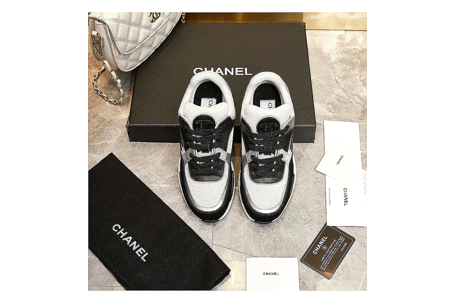 Kako Find List budget photos for Chanel Black White Runner Sneaker thumbnail 5