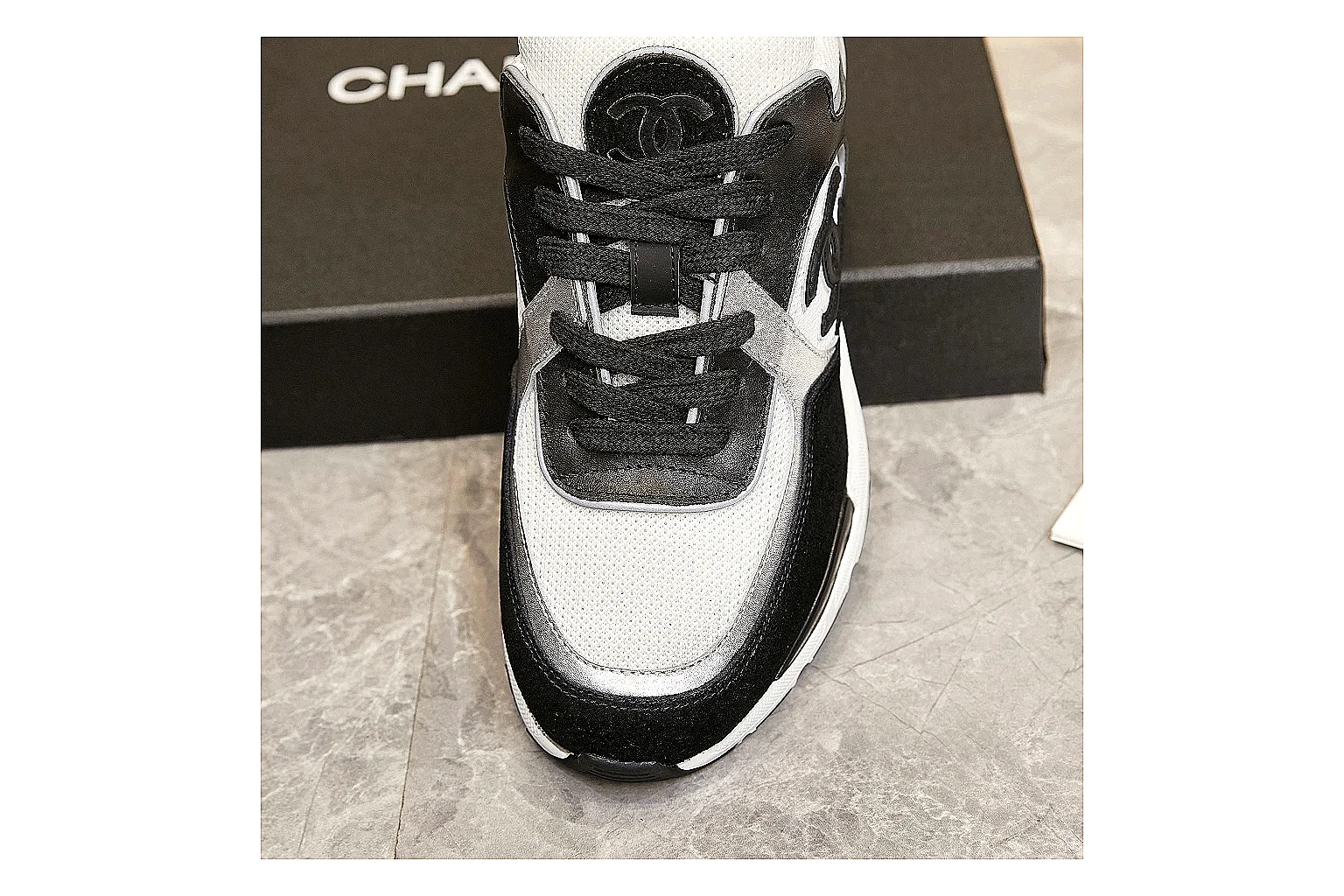 Kako Find List budget photos for Chanel Black White Runner Sneaker thumbnail 6