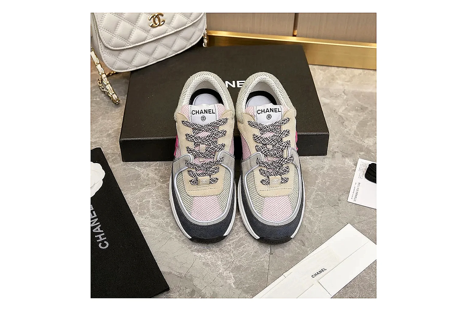 Kako Find List budget photos for Chanel Black White Runner Sneaker thumbnail 4