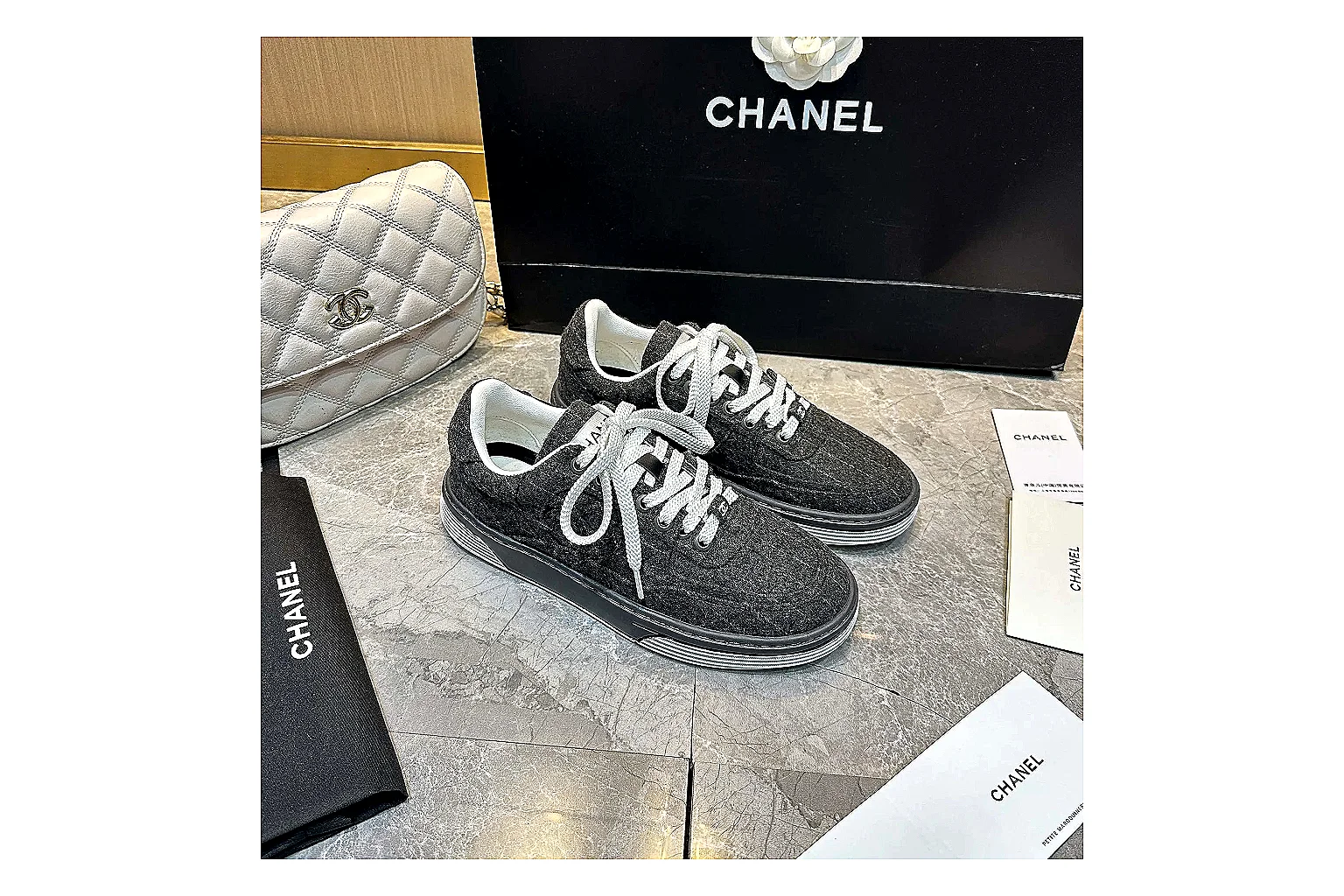 Kako Find List budget photos for Chanel Black White Runner Sneaker thumbnail 2