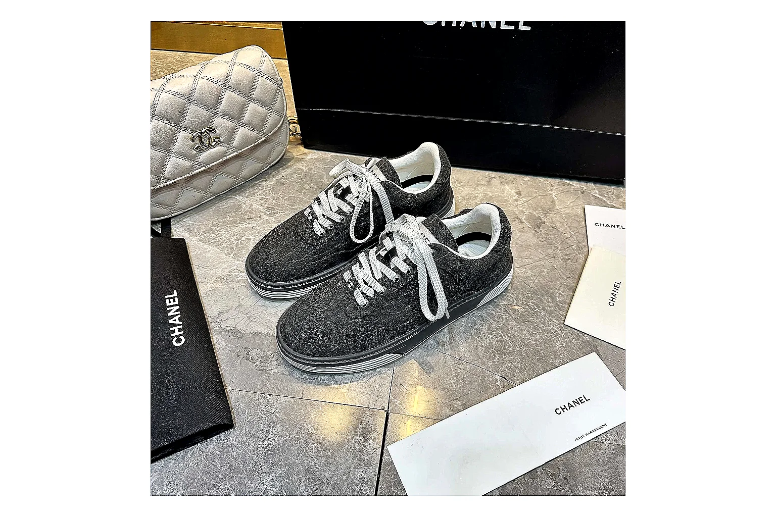 Kako Find List budget photos for Chanel Black White Runner Sneaker thumbnail 3