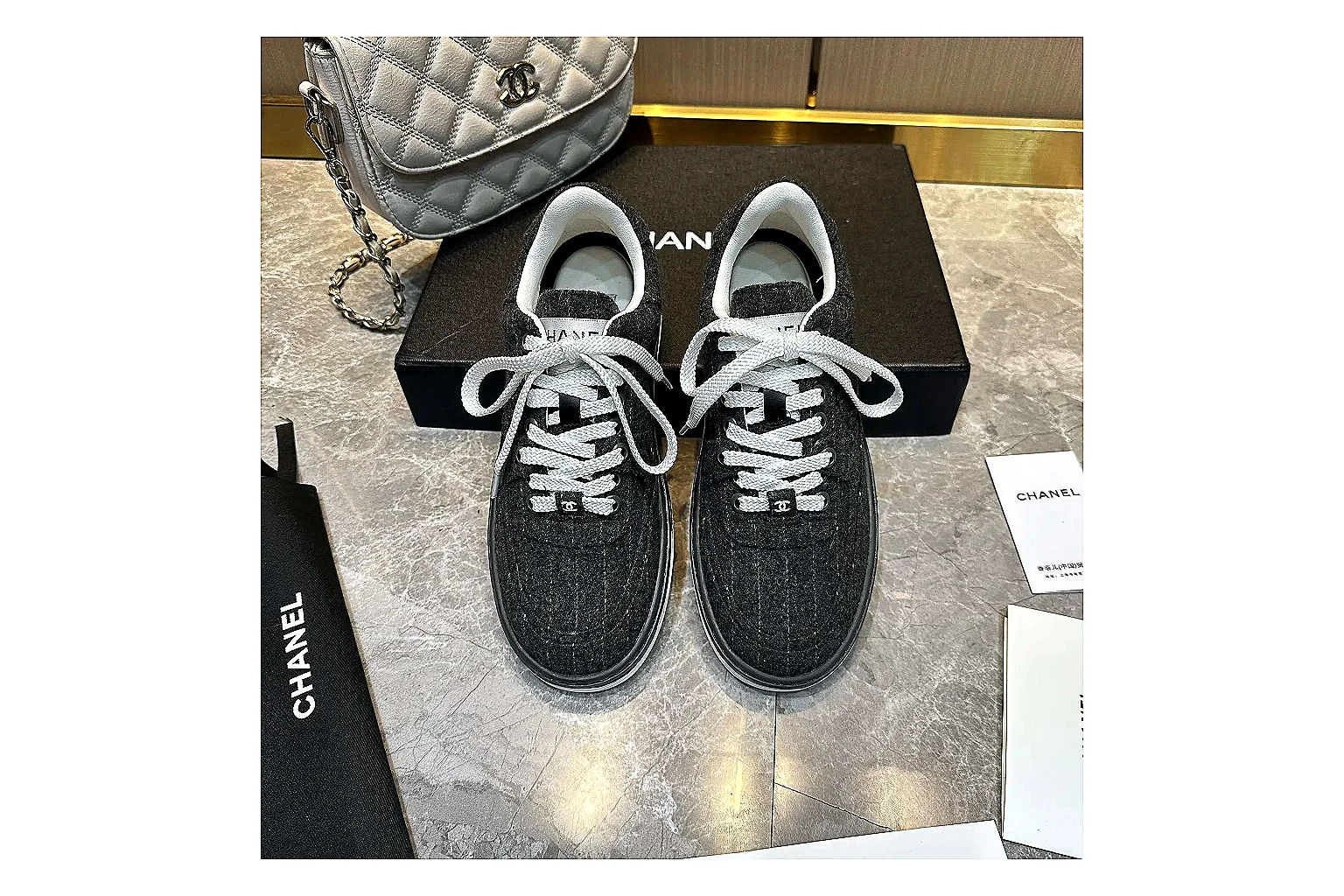 Kako Find List budget photos for Chanel Black White Runner Sneaker thumbnail 6