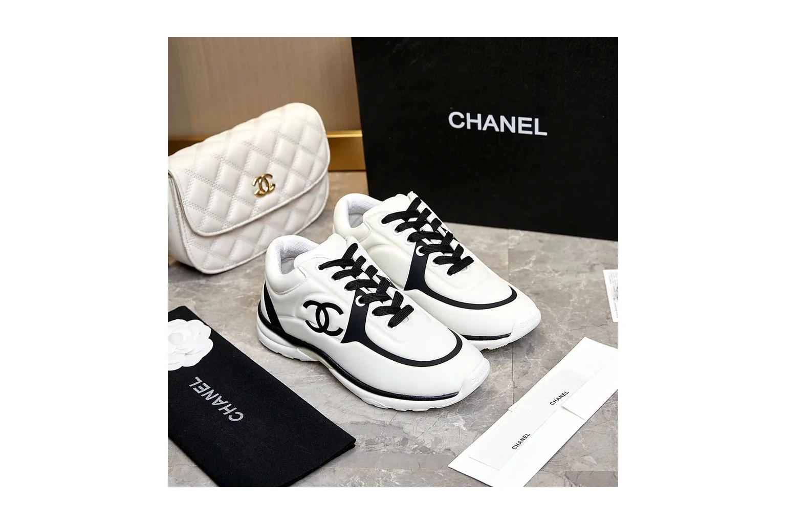Chanel CC Low Top White Black luxury low top six photo view thumbnail 2