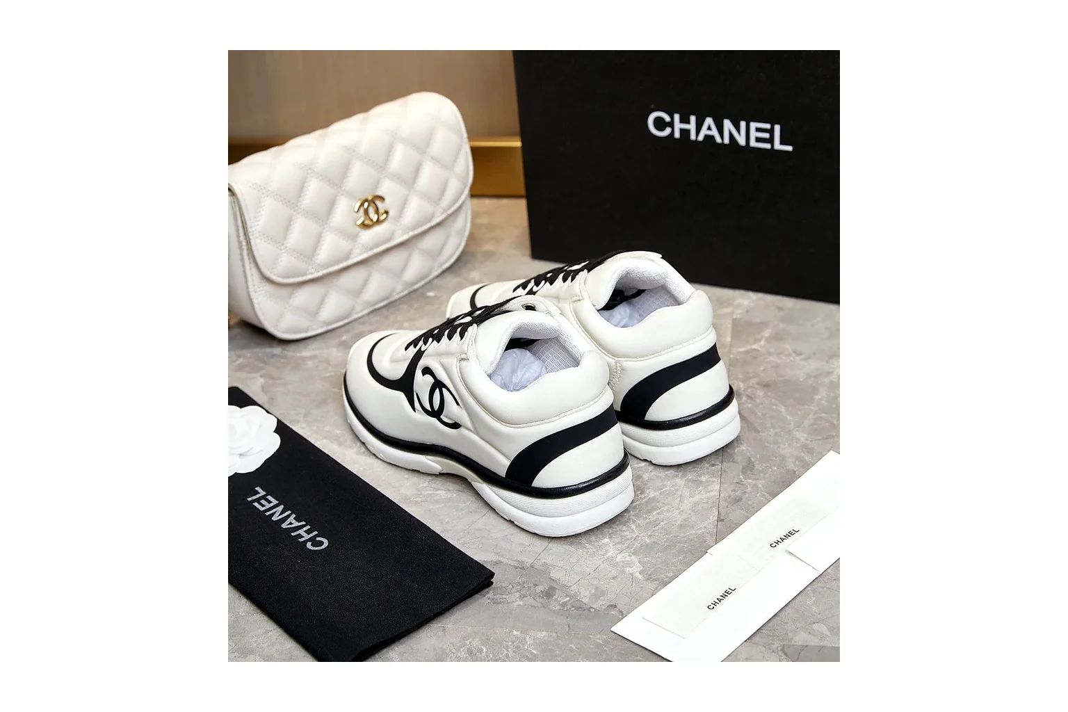 Chanel CC Low Top White Black luxury low top six photo view thumbnail 4