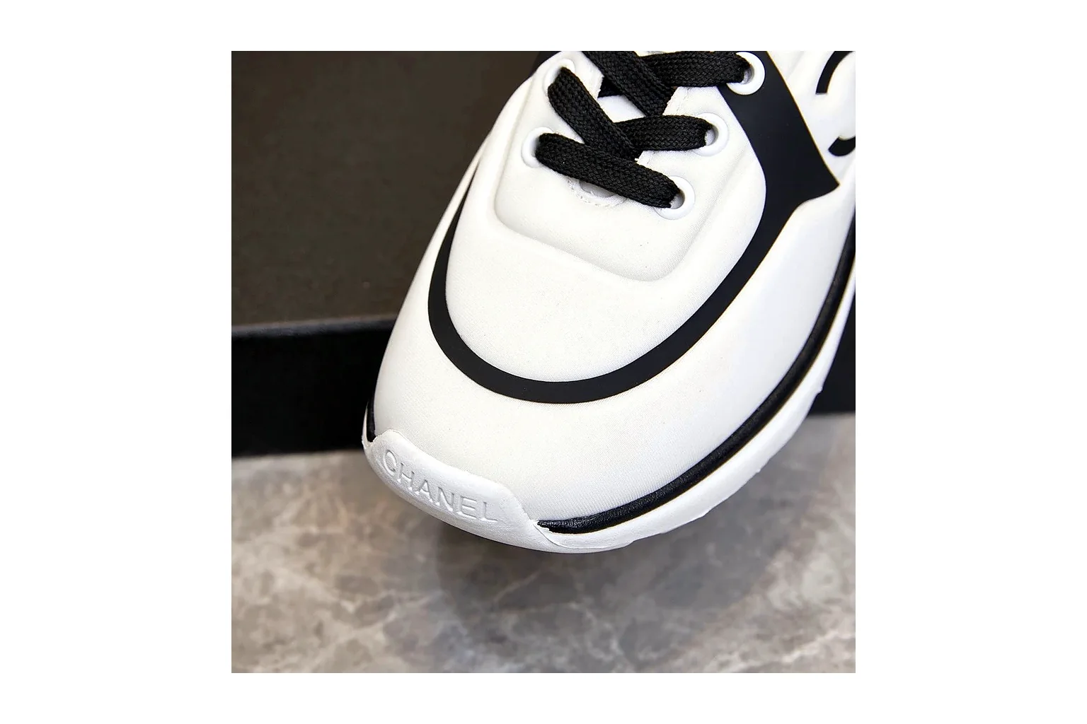 Chanel CC Low Top White Black luxury low top six photo view thumbnail 5