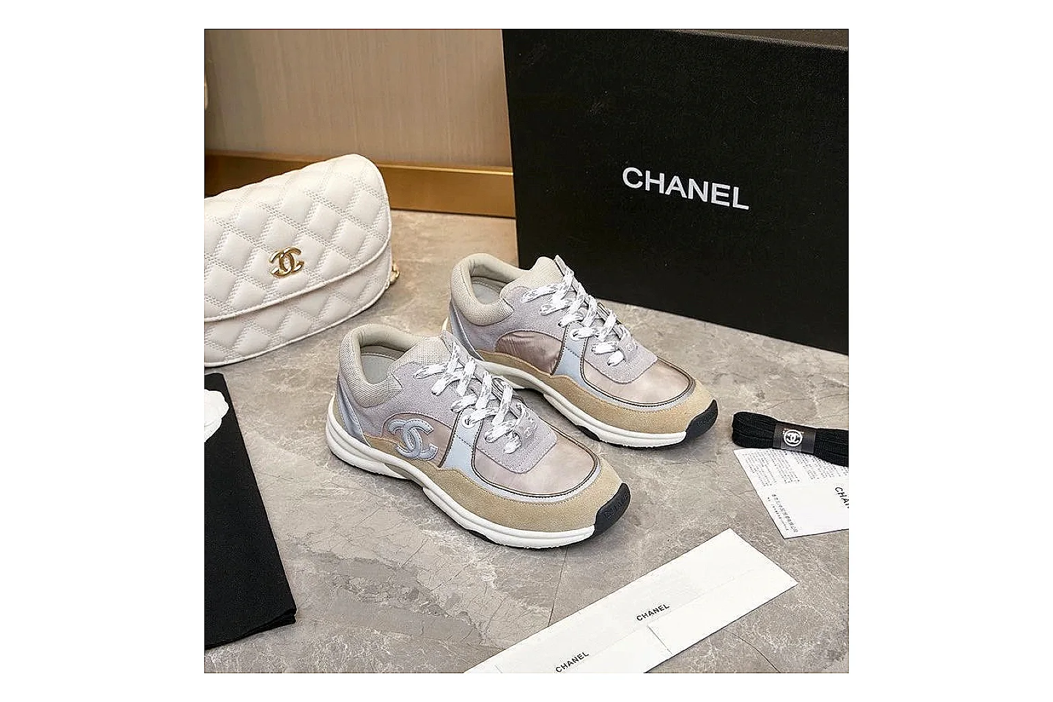 Kako Find List budget photos for Chanel Gray Pink Runner Sneaker thumbnail 2