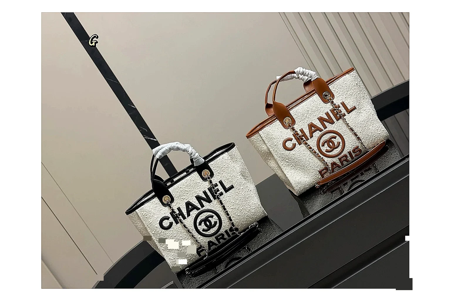 Chanel Tote Bag White Black budget find photo showing white black canvas-leather tote body, open carry shape, structured handles, and branded luxury-bag details
