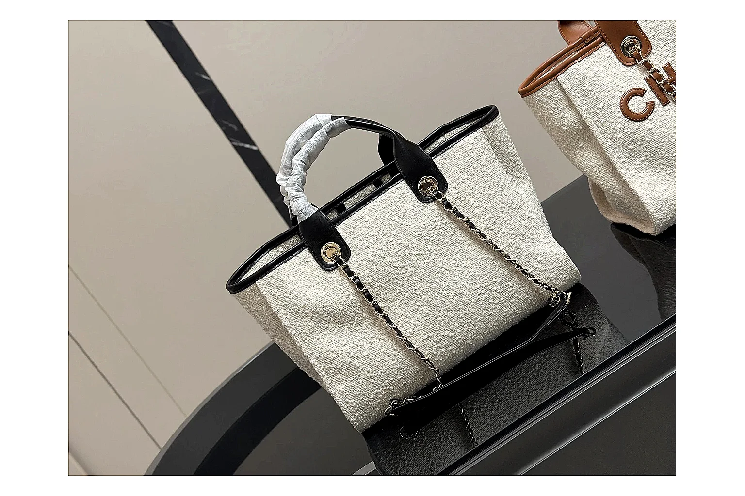 Chanel Tote Bag White Black budget find photo showing white black canvas-leather tote body, open carry shape, structured handles, and branded luxury-bag details thumbnail 6