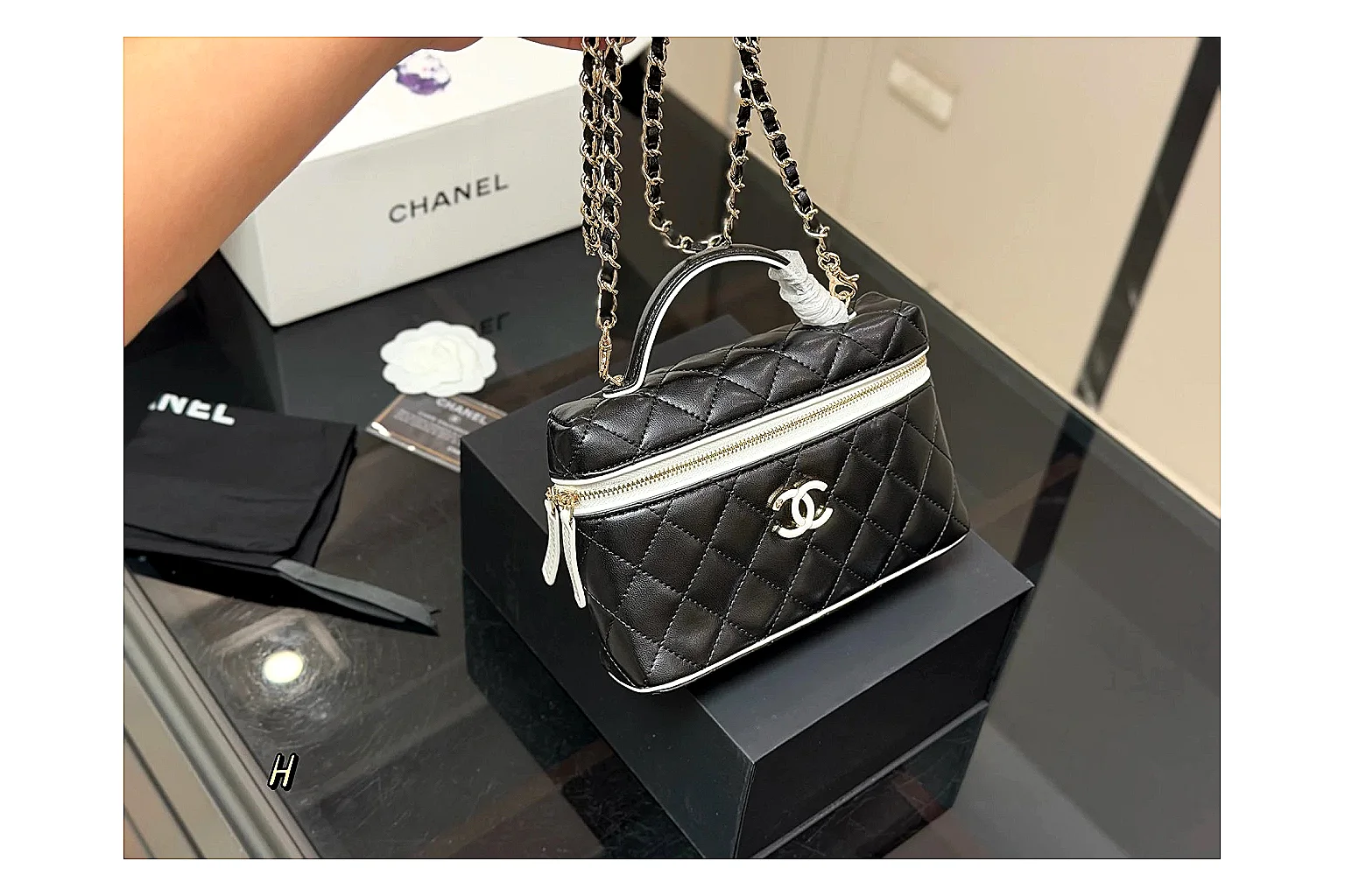 Chanel Wallet On Chain Black budget find photo showing black quilted leather wallet body, chain strap, flap closure, and compact shoulder-bag profile thumbnail 2