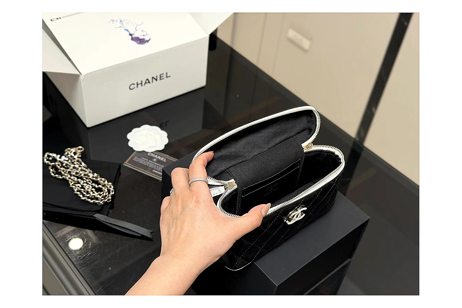 Chanel Wallet On Chain Black budget find photo showing black quilted leather wallet body, chain strap, flap closure, and compact shoulder-bag profile thumbnail 5