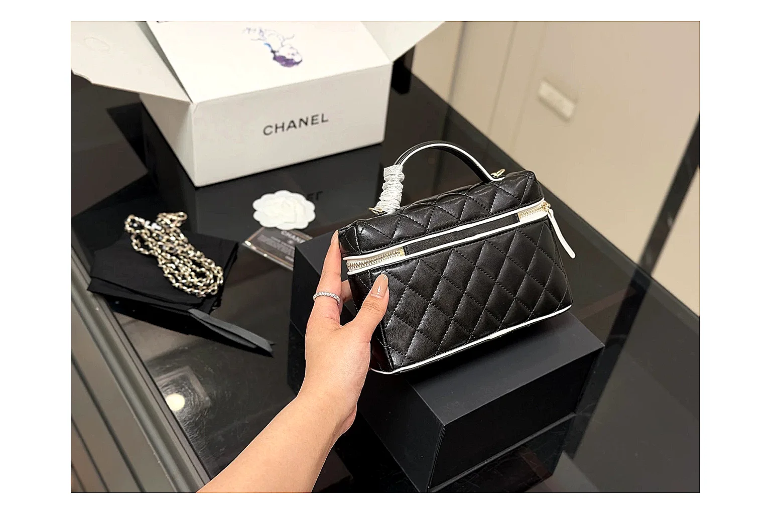 Chanel Wallet On Chain Black budget find photo showing black quilted leather wallet body, chain strap, flap closure, and compact shoulder-bag profile thumbnail 6