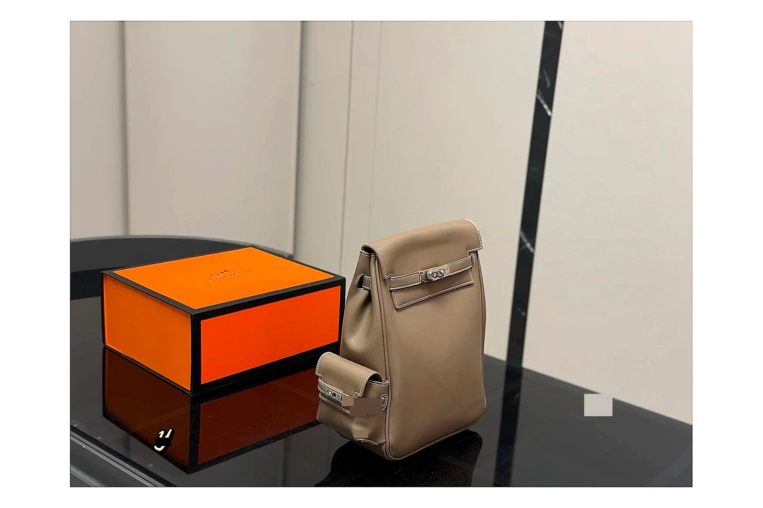 Hermes Kelly Backpack Beige budget find photo showing beige leather backpack body, Kelly-style flap, top handle, shoulder straps, and polished hardware