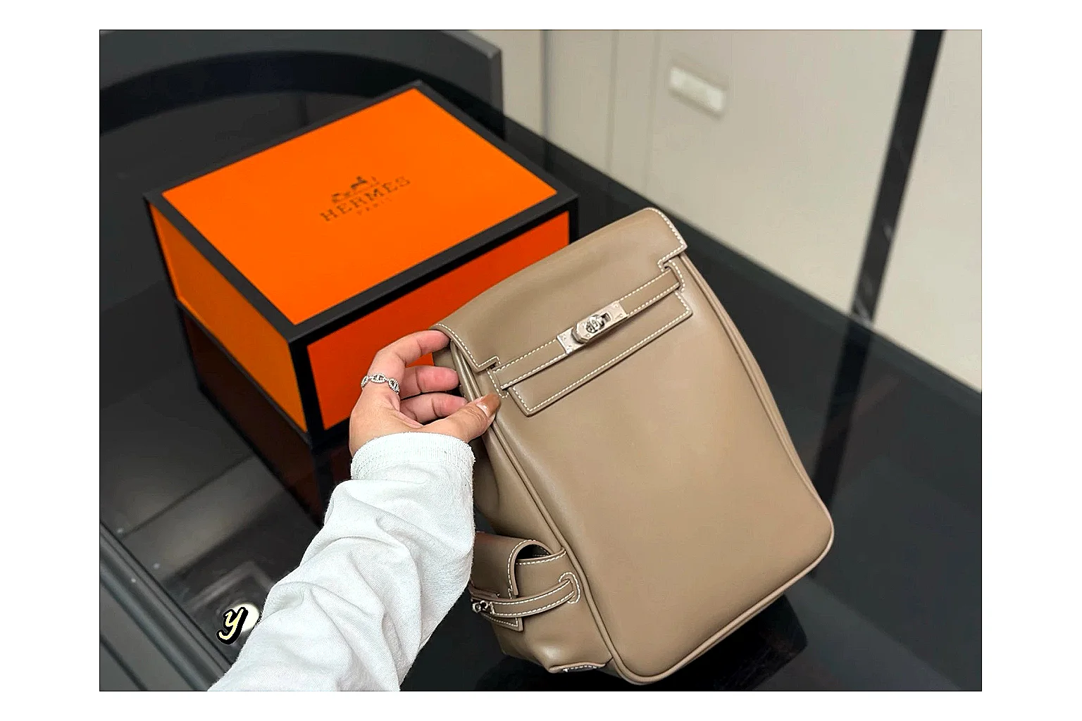 Hermes Kelly Backpack Beige budget find photo showing beige leather backpack body, Kelly-style flap, top handle, shoulder straps, and polished hardware thumbnail 2
