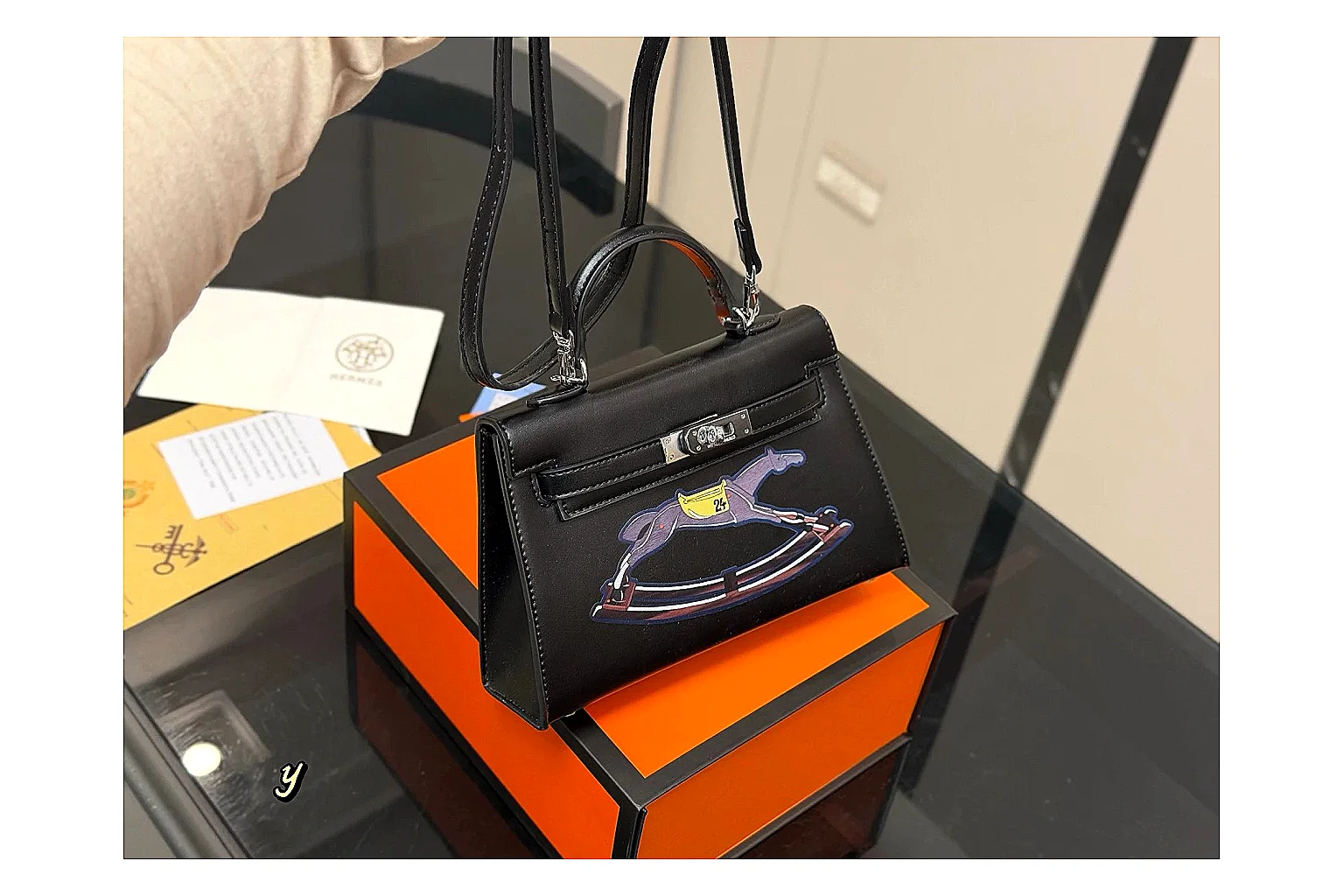 Louis Vuitton Wallet On Chain Black budget find photo showing black leather compact wallet bag, chain strap, flap body, and neat luxury hardware thumbnail 2