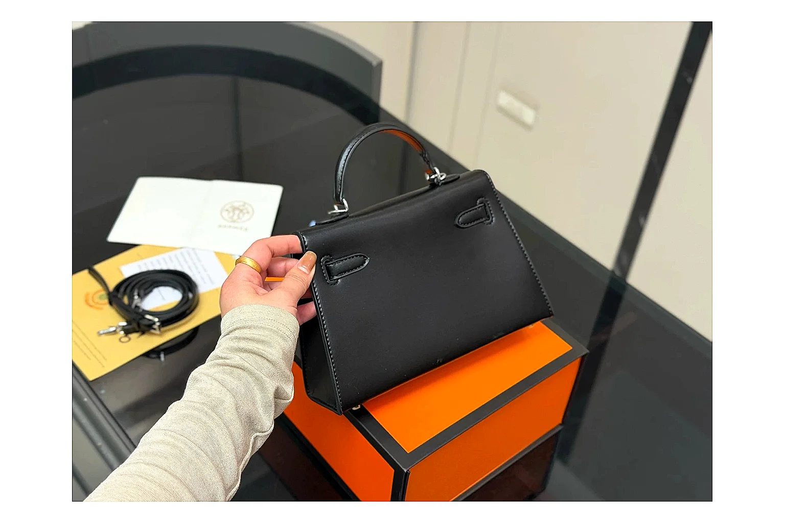 Louis Vuitton Wallet On Chain Black budget find photo showing black leather compact wallet bag, chain strap, flap body, and neat luxury hardware thumbnail 6