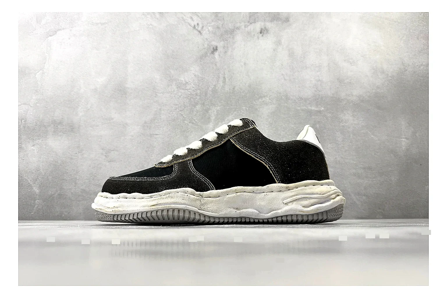 Maison Mihara Yasuhiro Blakey Black Distressed budget find photo showing black distressed canvas upper, warped sculpted white sole, low lace profile, and worn texture