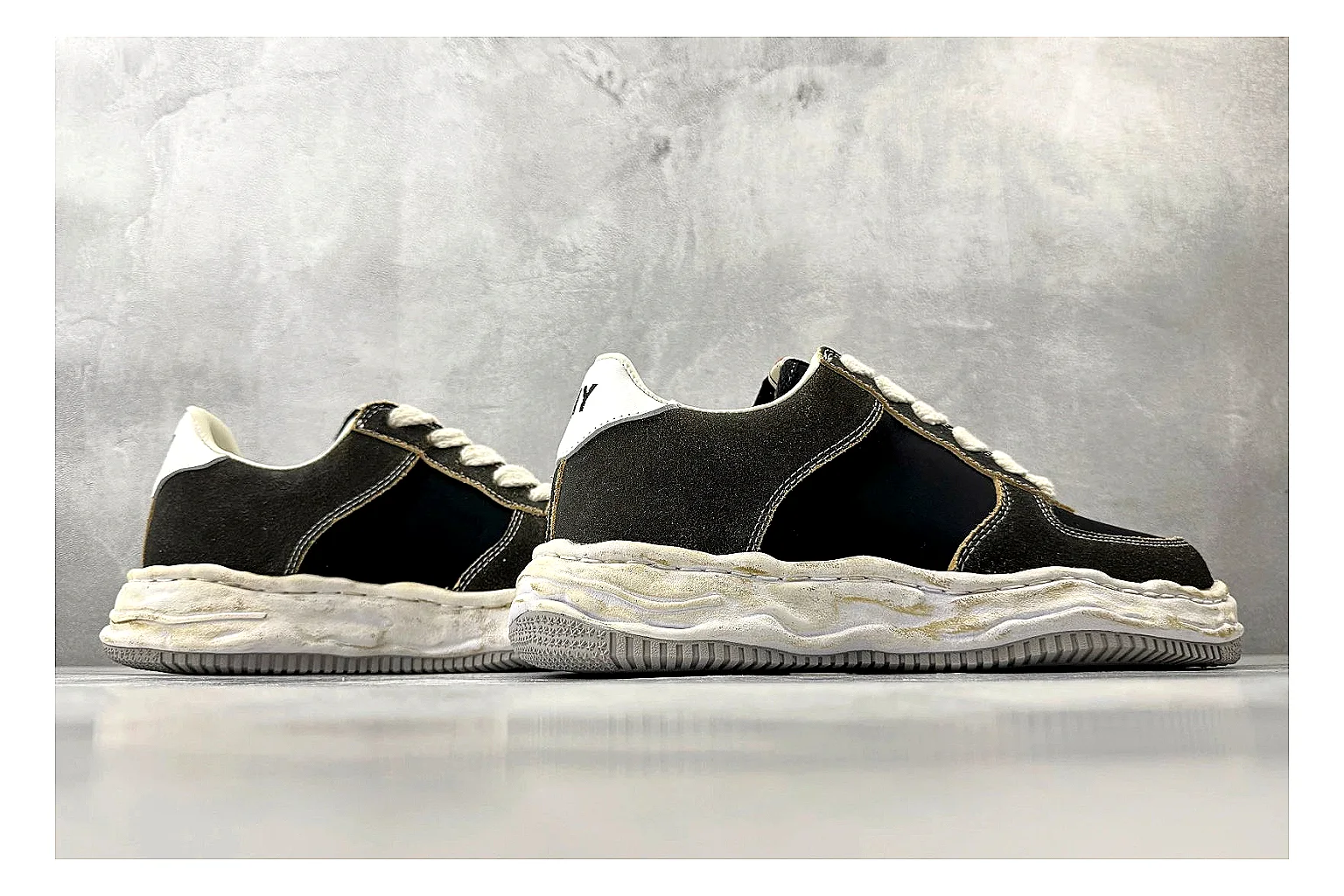Maison Mihara Yasuhiro Blakey Black Distressed budget find photo showing black distressed canvas upper, warped sculpted white sole, low lace profile, and worn texture thumbnail 4