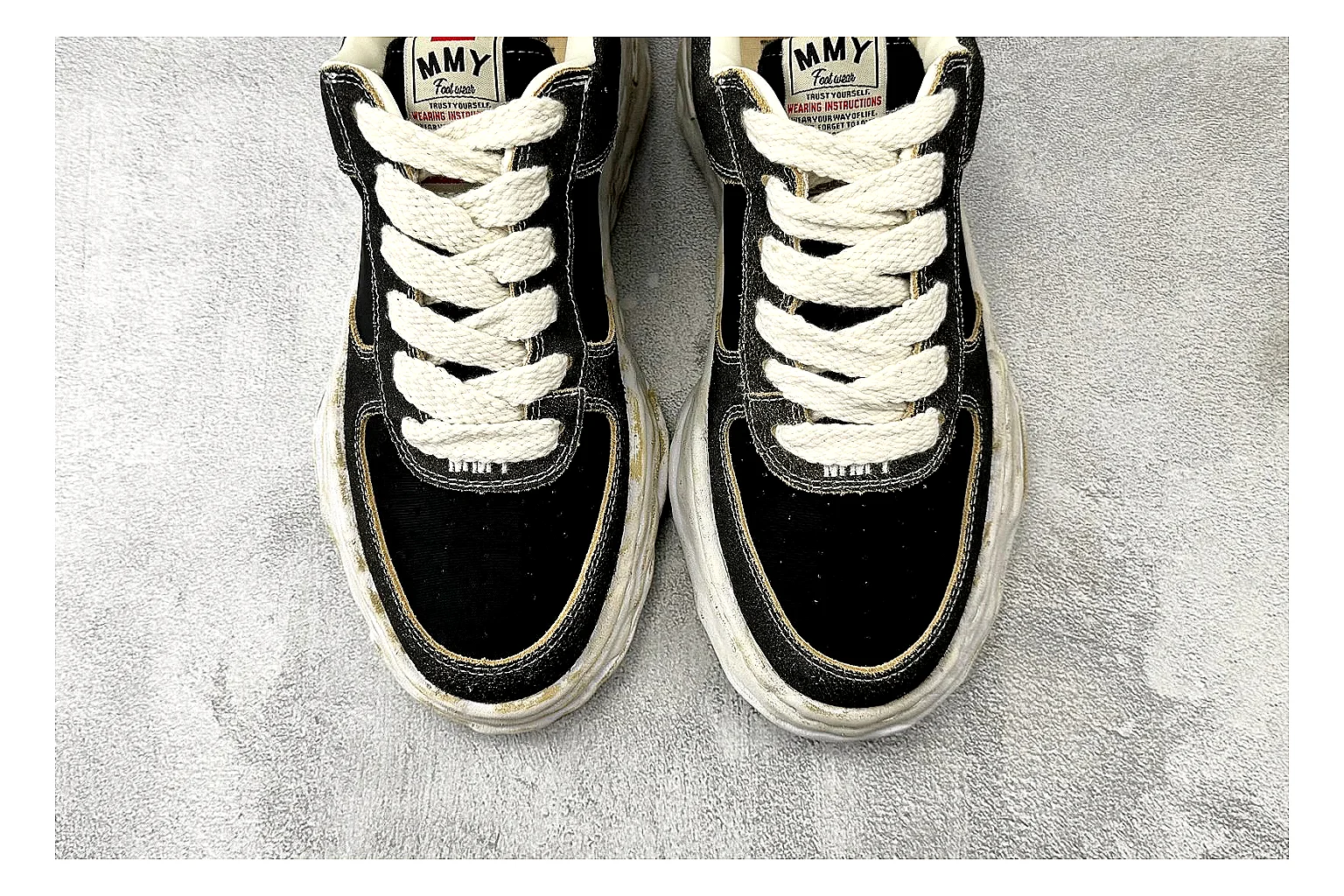 Maison Mihara Yasuhiro Blakey Black Distressed budget find photo showing black distressed canvas upper, warped sculpted white sole, low lace profile, and worn texture thumbnail 6