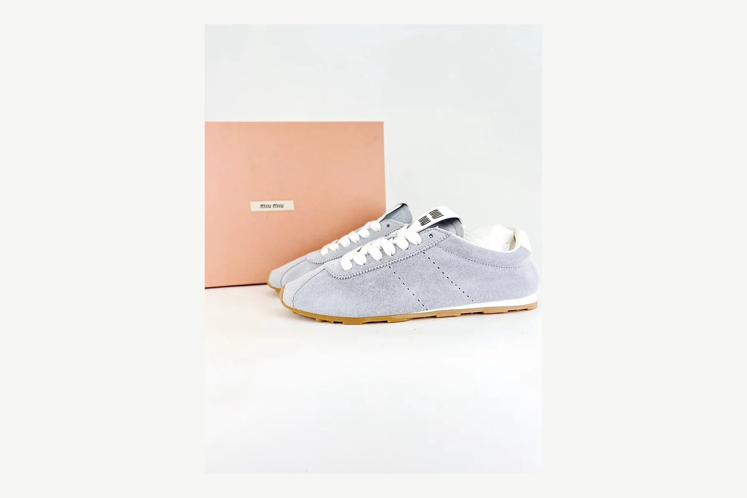 Grey Miu Miu low top on a considered premium-neutral shortlist thumbnail 2