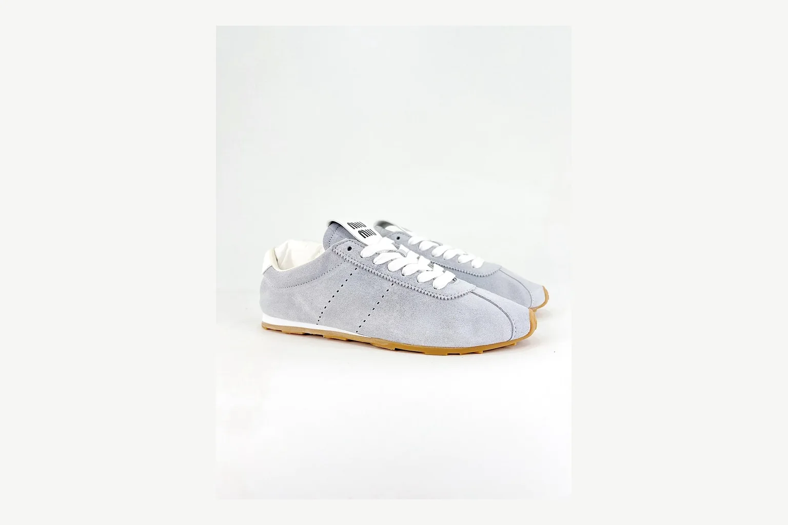 Grey Miu Miu low top on a considered premium-neutral shortlist thumbnail 3