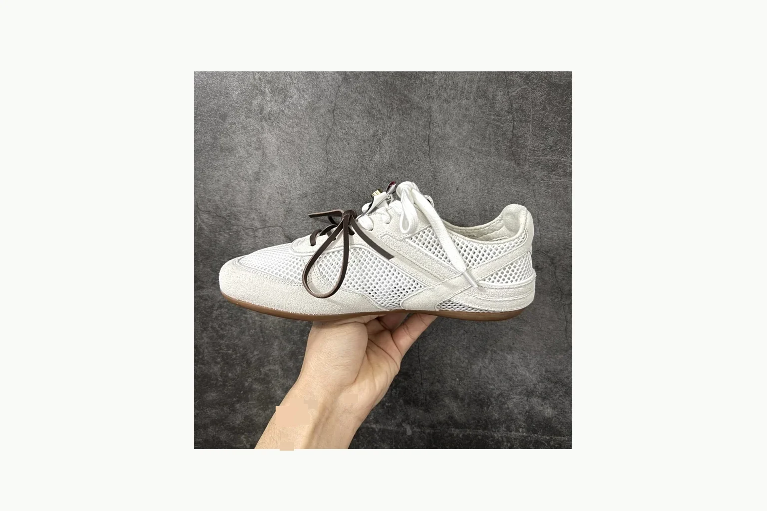 Miu Miu White Bow Sneaker value find image showing white bow-detail low-top with mixed-material upper and low-profile shape