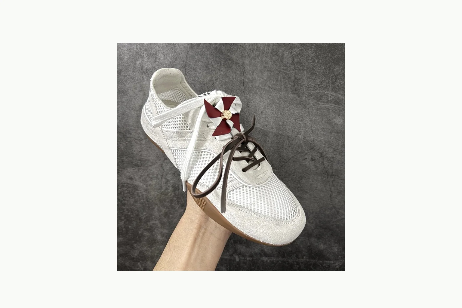 White Miu Miu bow sneaker on a deliberate premium shortlist thumbnail 3