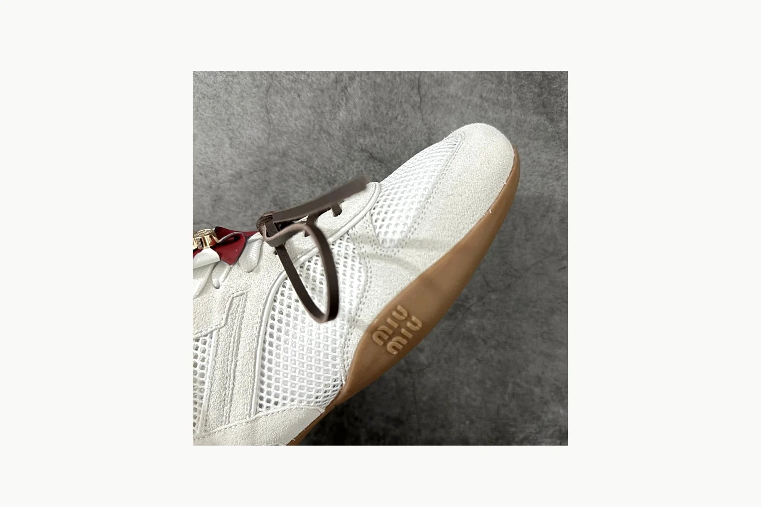 White Miu Miu bow sneaker on a deliberate premium shortlist thumbnail 6