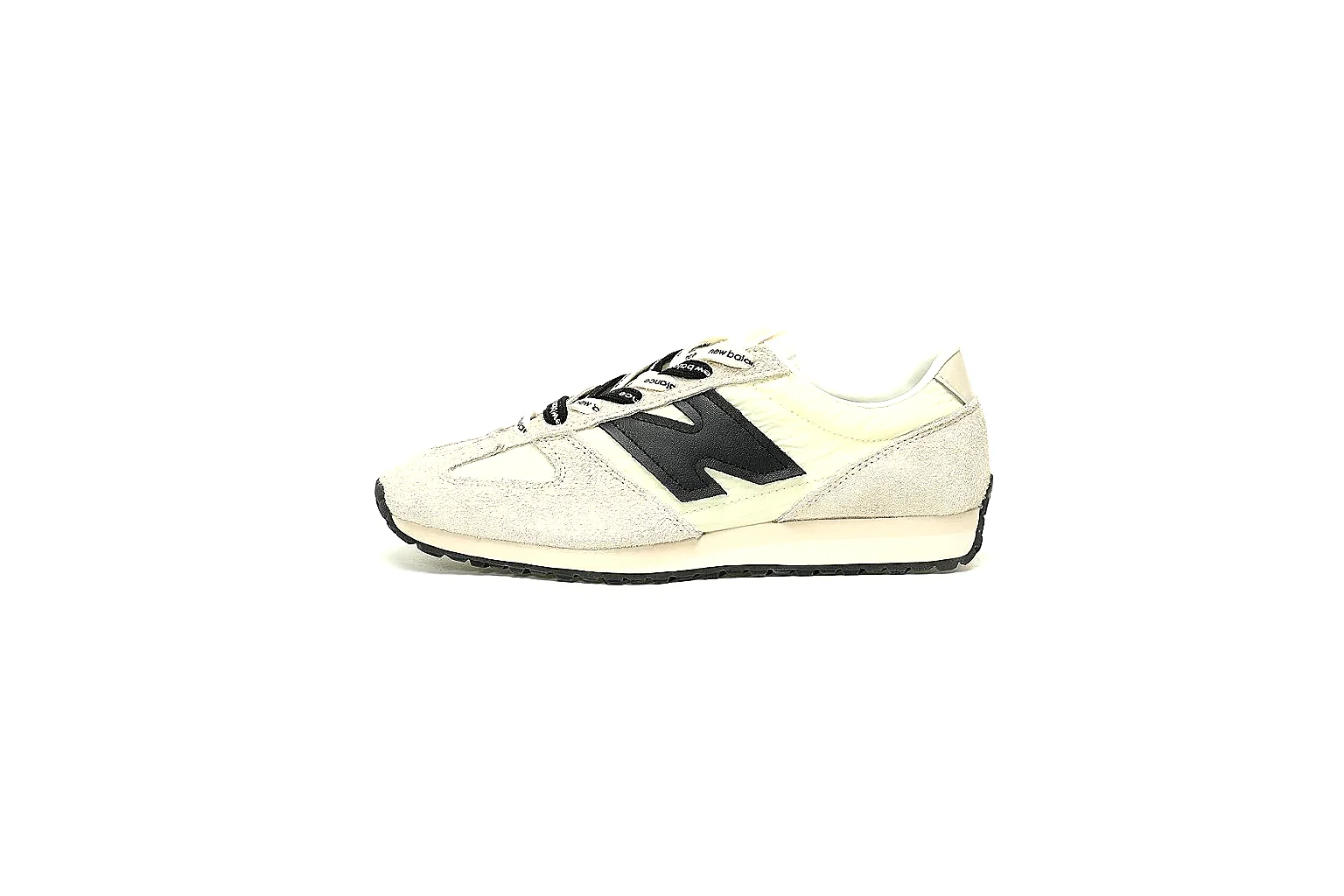 New Balance cream black runner for CNY 420 value shortlist