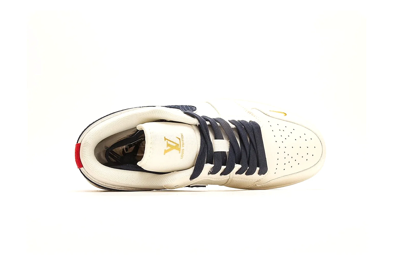 Nike Air Court Cream Navy Low Top budget find photo showing cream leather upper, navy Swoosh, dark laces, red heel accents, and gold side graphics thumbnail 3