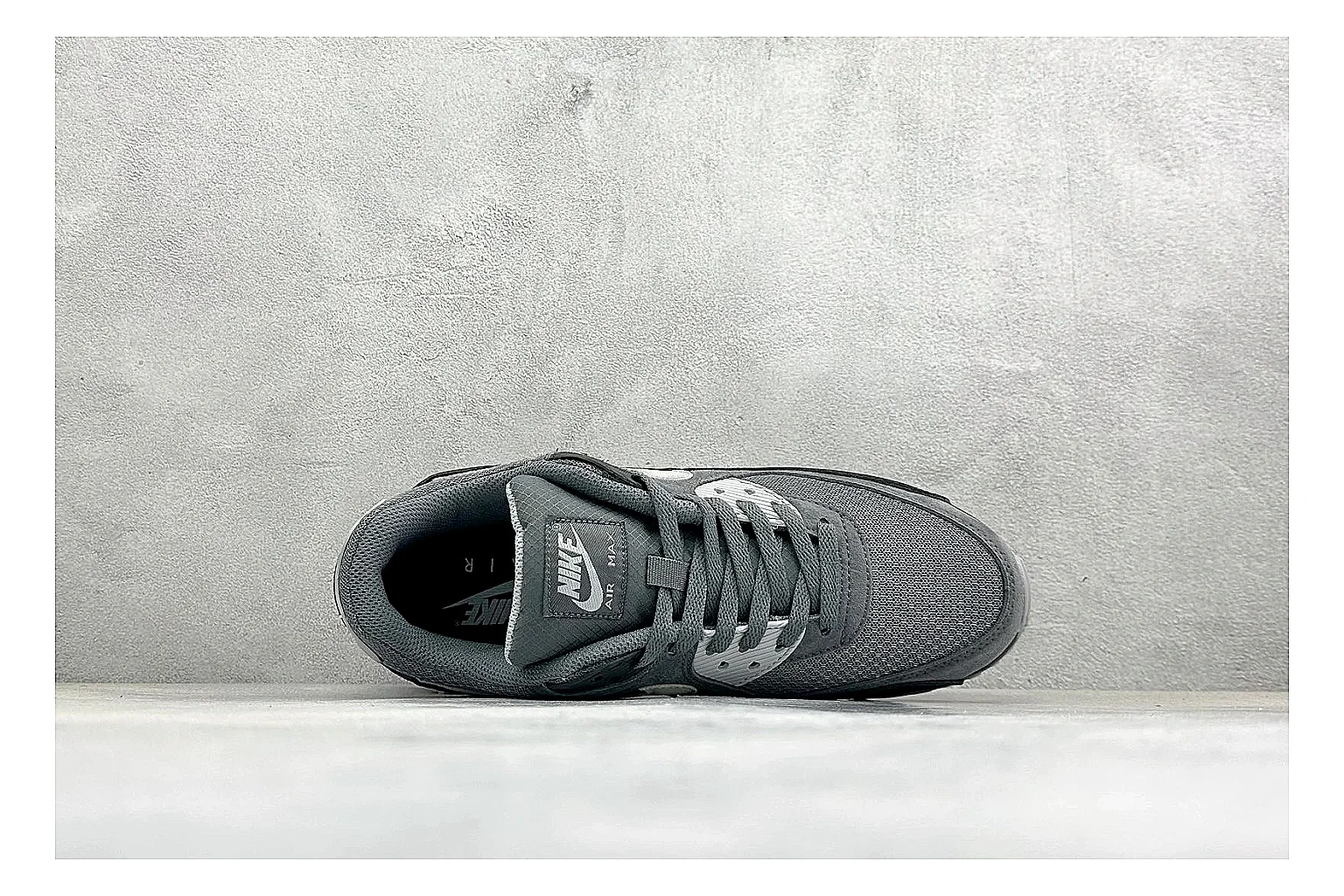 Nike Air Max 90 Grey Black budget find photo showing grey and black layered upper, visible Air window, classic Air Max 90 panels, and sturdy retro sole thumbnail 3