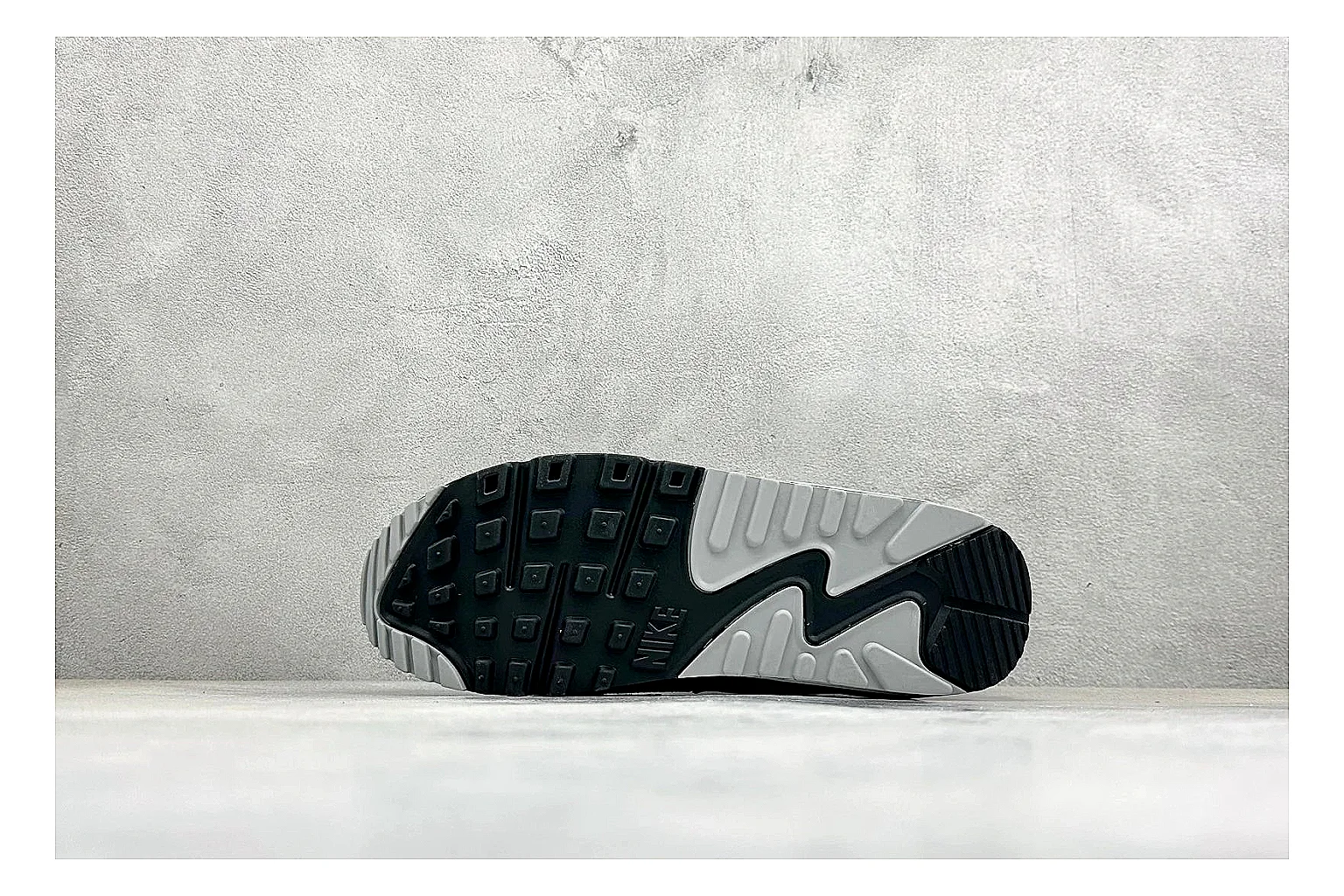 Nike Air Max 90 Grey Black budget find photo showing grey and black layered upper, visible Air window, classic Air Max 90 panels, and sturdy retro sole thumbnail 5