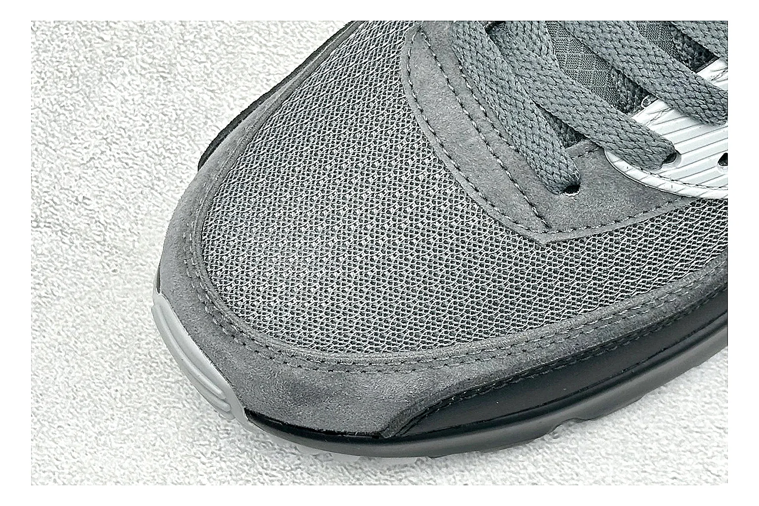 Nike Air Max 90 Grey Black budget find photo showing grey and black layered upper, visible Air window, classic Air Max 90 panels, and sturdy retro sole thumbnail 6
