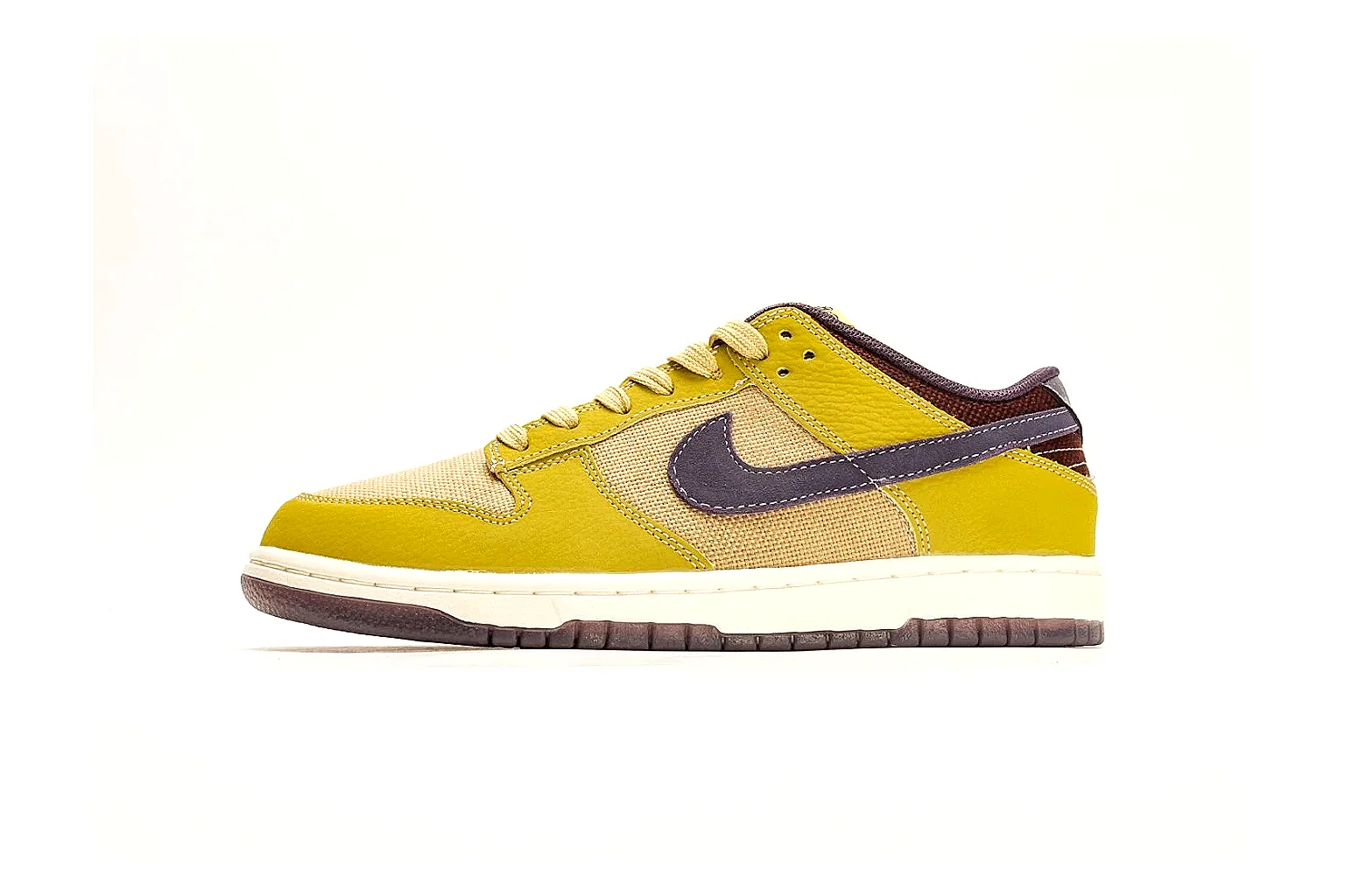 Nike Dunk Low Yellow Purple budget find photo showing yellow and purple leather panels, dark Swoosh, heel overlay, cream midsole, and brown outsole