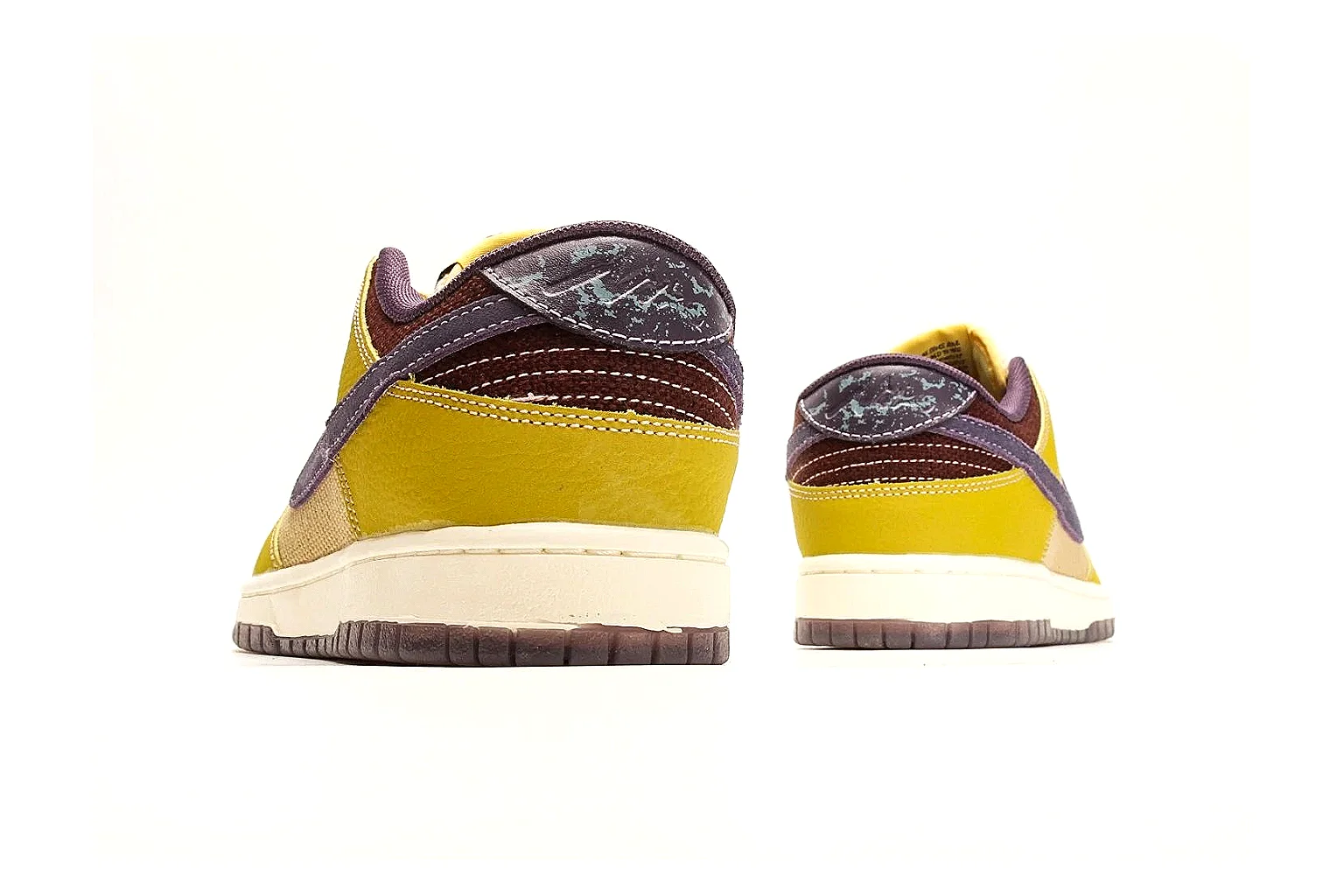 Nike Dunk Low Yellow Purple budget find photo showing yellow and purple leather panels, dark Swoosh, heel overlay, cream midsole, and brown outsole thumbnail 4