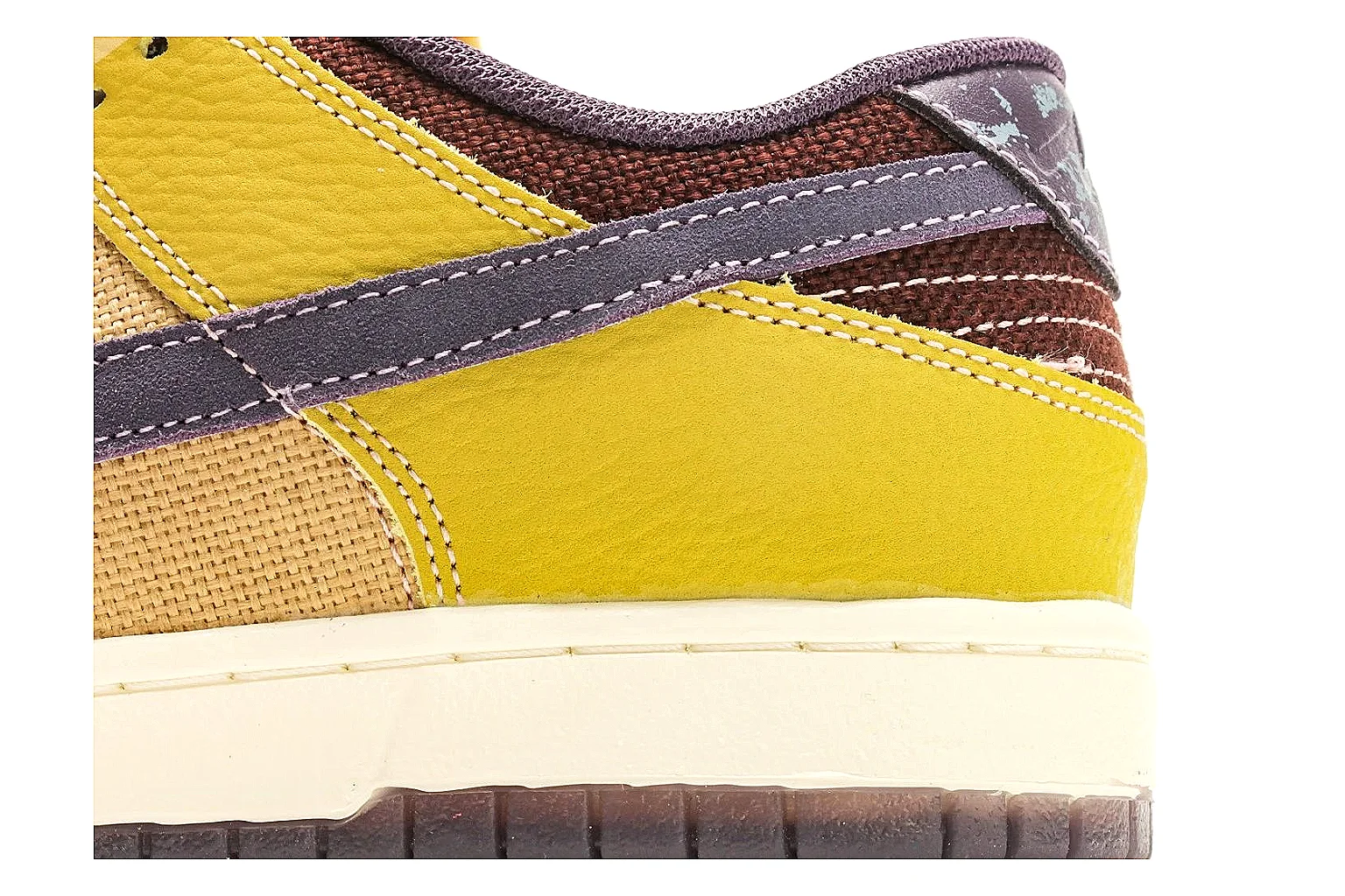 Nike Dunk Low Yellow Purple budget find photo showing yellow and purple leather panels, dark Swoosh, heel overlay, cream midsole, and brown outsole thumbnail 6