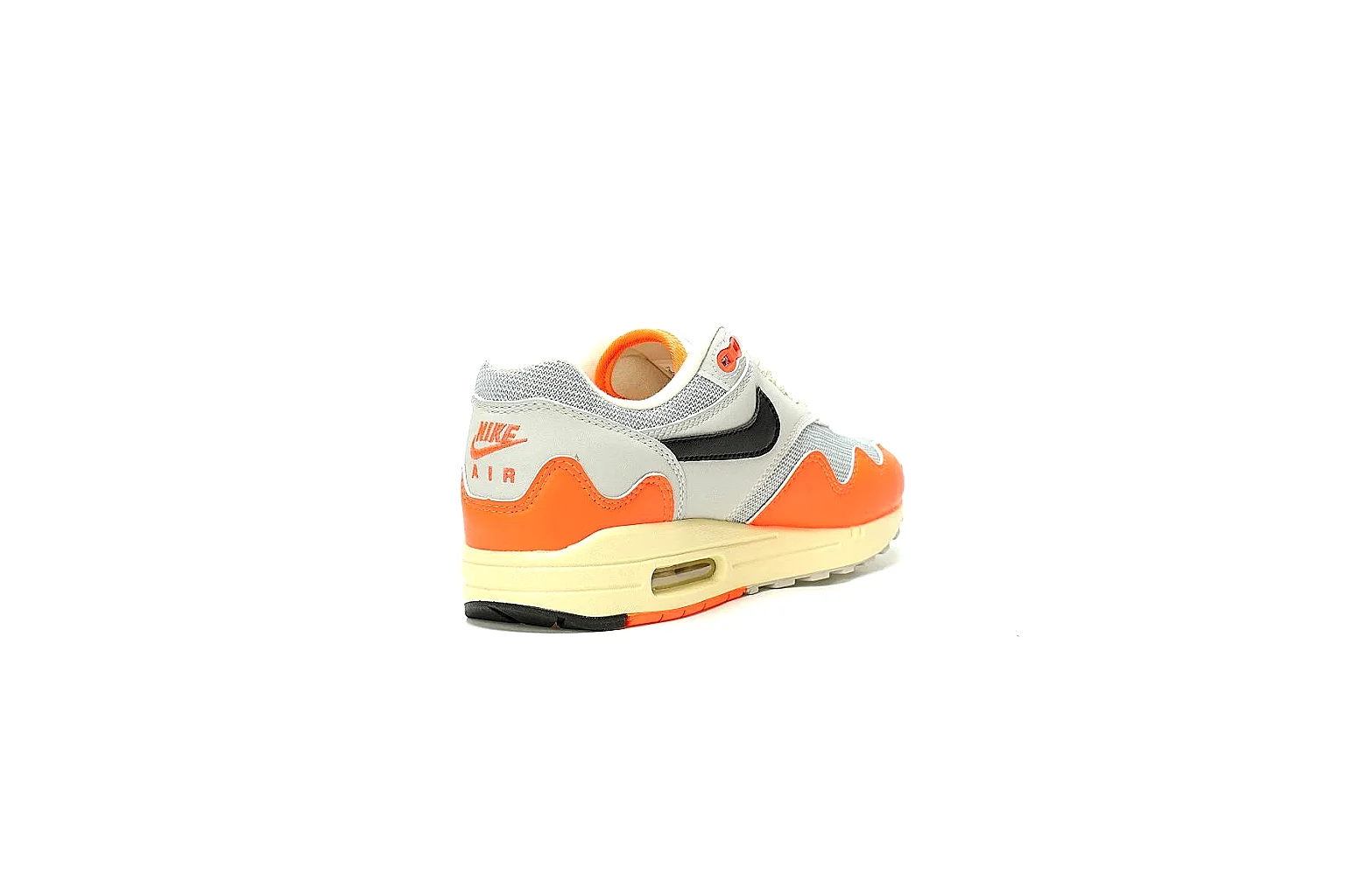 Kako Find List budget photos for Nike Orange Cream Retro Runner Sneaker thumbnail 2